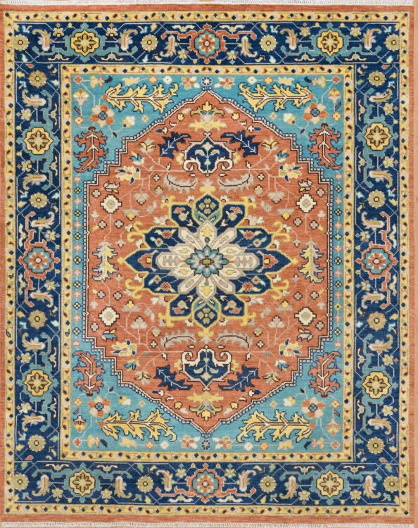 Hand-knotted wool Oushak rug with large rust central medallion, navy border, and gold and blue floral accents in a traditional layout.