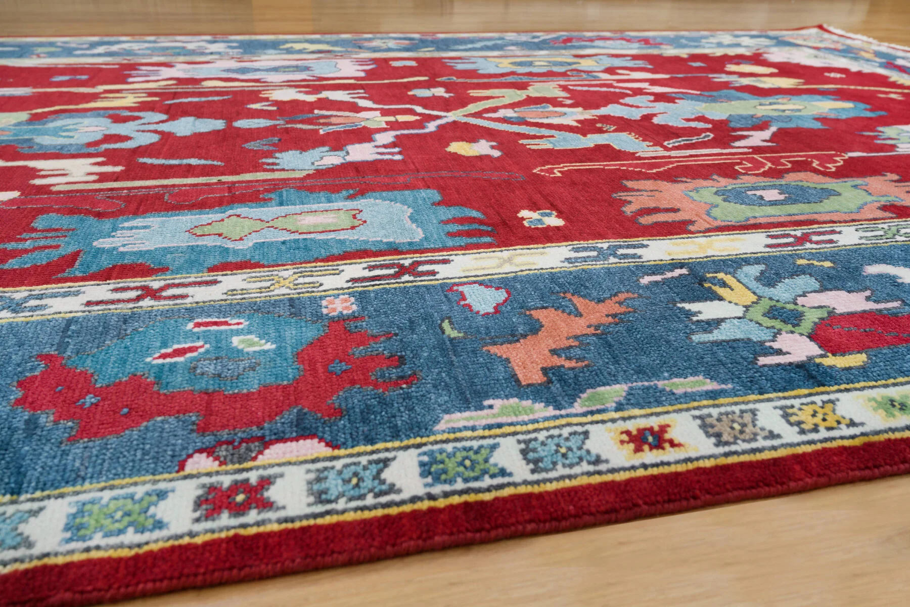 Red Hand-Knotted Floral Rug – Palmette & Branching Stem