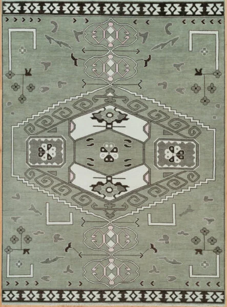 Hand-knotted modern Oushak wool rug with a sage green field, large central hexagonal medallion, stepped geometric motifs and a dark charcoal border.